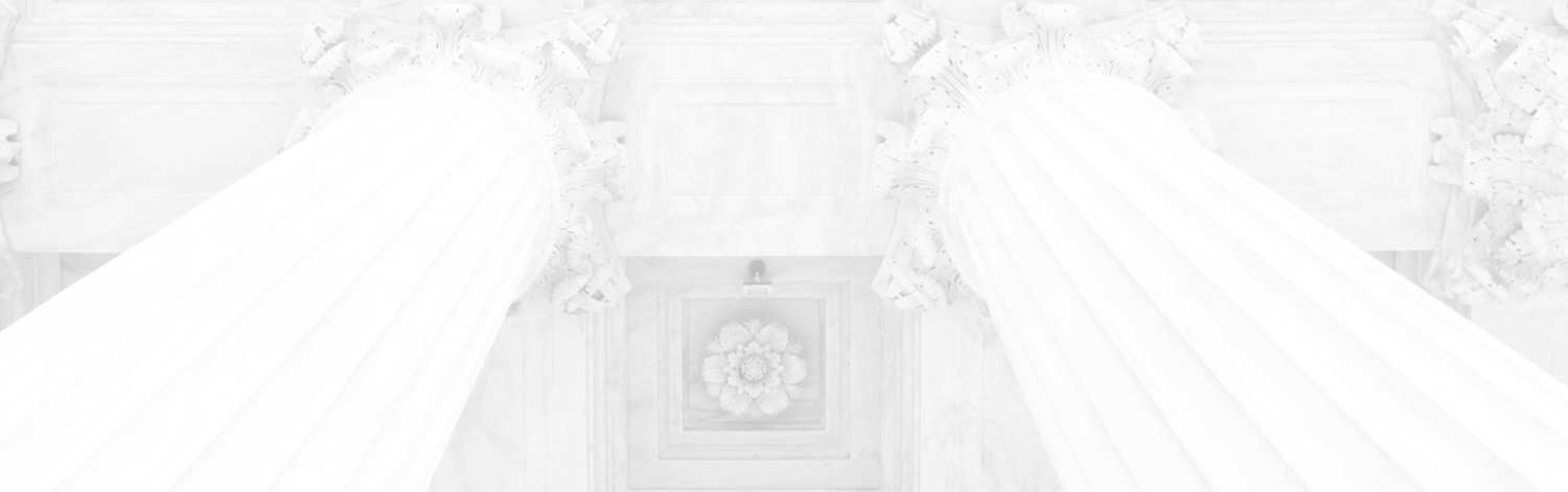 grey columns outside a courthouse